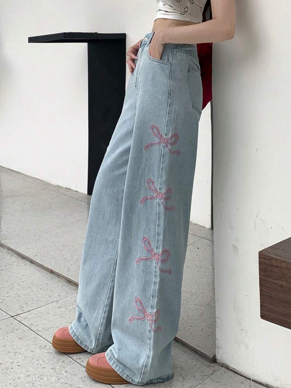 Wide Leg Light Blue Jeans with Pink Bow Stitching